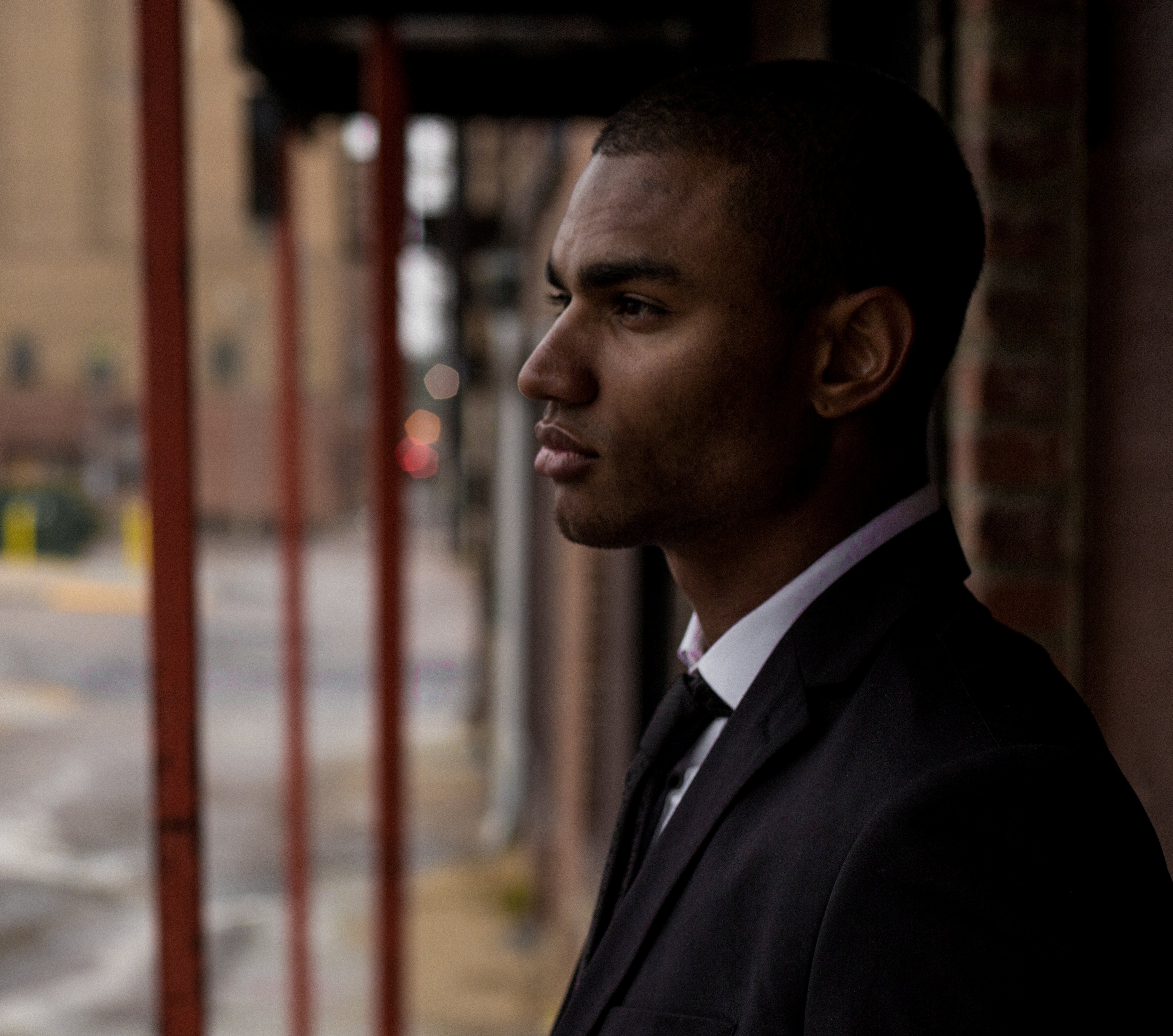 African american man in suit looking ahead